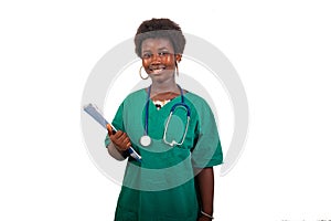 portrait of a smiling young trainee doctor holding a folder