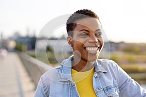 Portrait of smiling young woman in the city