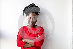 Portrait of a smiling young woman indoors