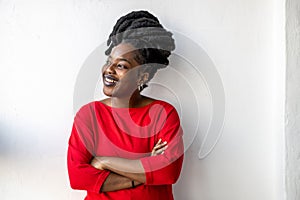 Portrait of a smiling young woman indoors