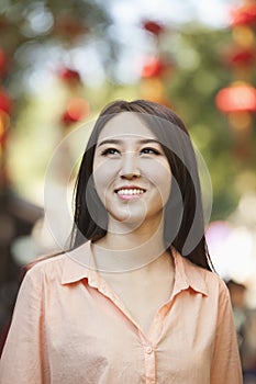 Portrait of Smiling Young Woman in Nanluoguxiang, Beijing