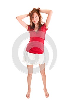 Portrait of a smiling young woman wearing a mini skirt and a red top
