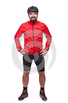 Portrait of smilling bicyclist with helmet and red jacket, isolated on white.