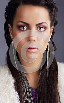 Portrait of Snazzy Fashion Model with Long Earrings photo