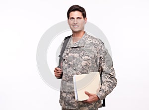 Portrait of a soldier with backpack and documents