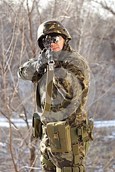 Portrait of soldier with a gun