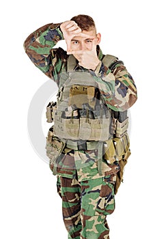 Portrait soldier or private military contractor framing with fingers.