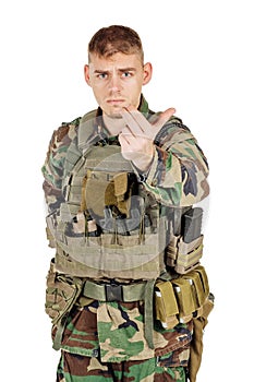 Portrait soldier or private military contractor with inviting or follow me gesture.