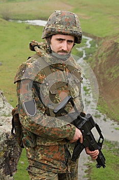 Portrait of soldier with a rifle