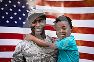 Portrait of soldier with son