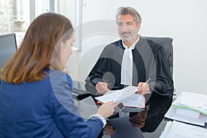 Portrait solicitor with client