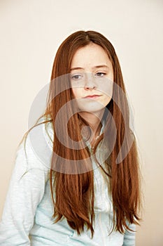 Portrait of a sorrowful looking teenage girl