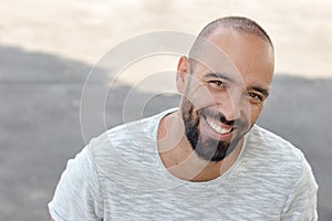 Portrait of a spanish man with snapback hat looking camera