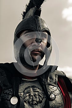 Portrait of Spartan warrior in armor and helmet