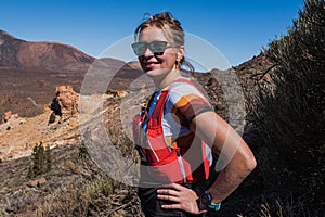 Portrait of the sport running woman in cross country trail run