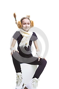 Portrait of Sporty Caucasian Teenage Girl Posing in  Iceskates With Hairtales Moving