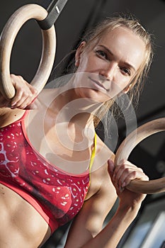 Portrait of Sporty woman showing well trained abdominal muscles