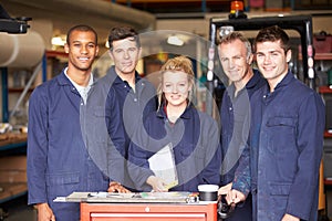 Portrait Of Staff Standing In Engineering Factory