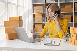 Portrait of Starting small businesses SME owners female entrepreneurs working on receipt box