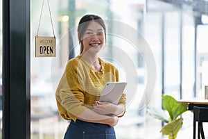 Portrait of Startup successful small business owner in coffee shop. SME entrepreneur seller business concept