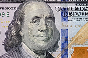 Portrait of Statesman, inventor, diplomat, and American founding father Benjamin Franklin on 100 US dollar.