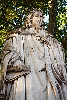 Portrait of the statue of Montesquieu in the park of the Place des Quinconces