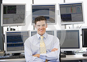 Portrait Of Stock Trader In Front Of Computer