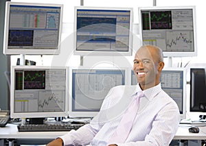 Portrait Of Stock Trader In Front Of Computer