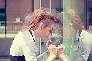 Portrait stressed sad young woman outdoors. Urban life style stress