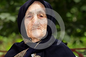 Portrait of strict elderly woman