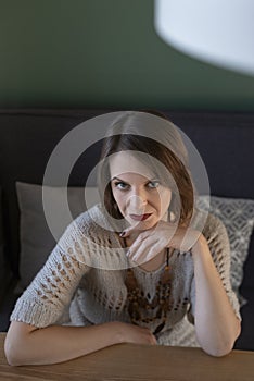 Portrait of strict serious middle-aged woman. Woman with hard look. Vertical frame