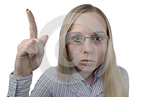 Portrait of a strict woman with glasses on a white background