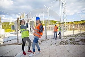 Portrait of strong and confident businesswomen working in electric power station