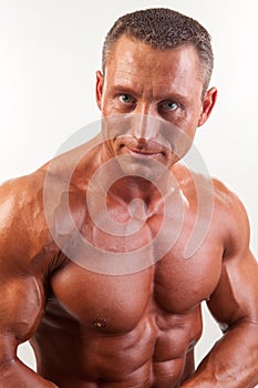 Portrait of strong handsome man - studio shot