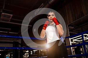 Portrait of strong muscular fitness woman ready to fight