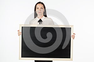 Portrait of a student, girl, holding a blank billboard.