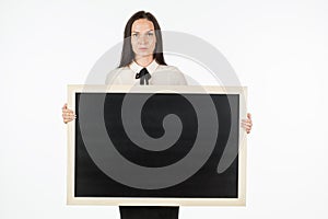 Portrait of a student, girl, holding a blank billboard.