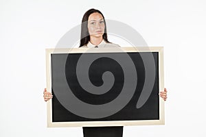 Portrait of a student, girl, holding a blank billboard.