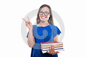 Portrait of student girl holding books shoeing peace