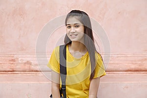 Portrait student girl wearing backpack