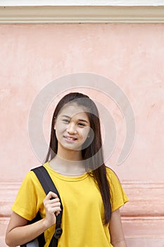 Portrait student girl wearing backpack