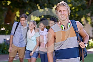 Portrait, student and smile of man at park, university campus or outdoor in nature. Face, college and happy young person