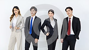 Portrait studio full body shot Asian young professional successful male female businessmen businesswomen management group in