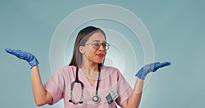 Portrait, studio and woman doctor pointing at choice for care, wellness or opinion for health insurance. Medical