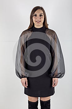 Portrait of a stunning young woman posing in little black dress