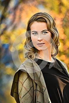 Portrait of a Stylish Pretty Young Woman in Autumn Fashion