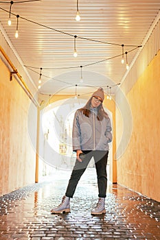 Portrait of a stylish woman in blue jacket