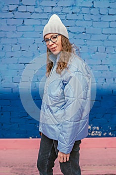 Portrait of a stylish woman in blue jacket
