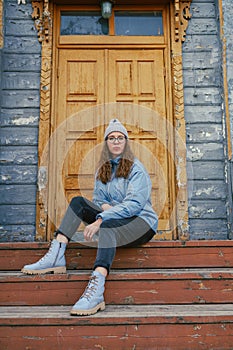 Portrait of a stylish woman in blue jacket