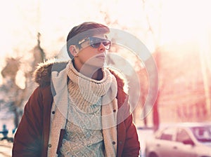 Portrait of stylish young man in sunglasses